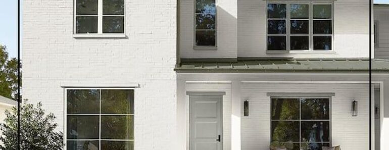 Modern white brick Swiss house exterior with a clean architectural design.